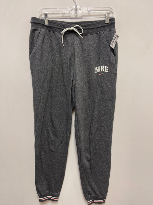 Athletic Pants By Nike In Grey, Size: M